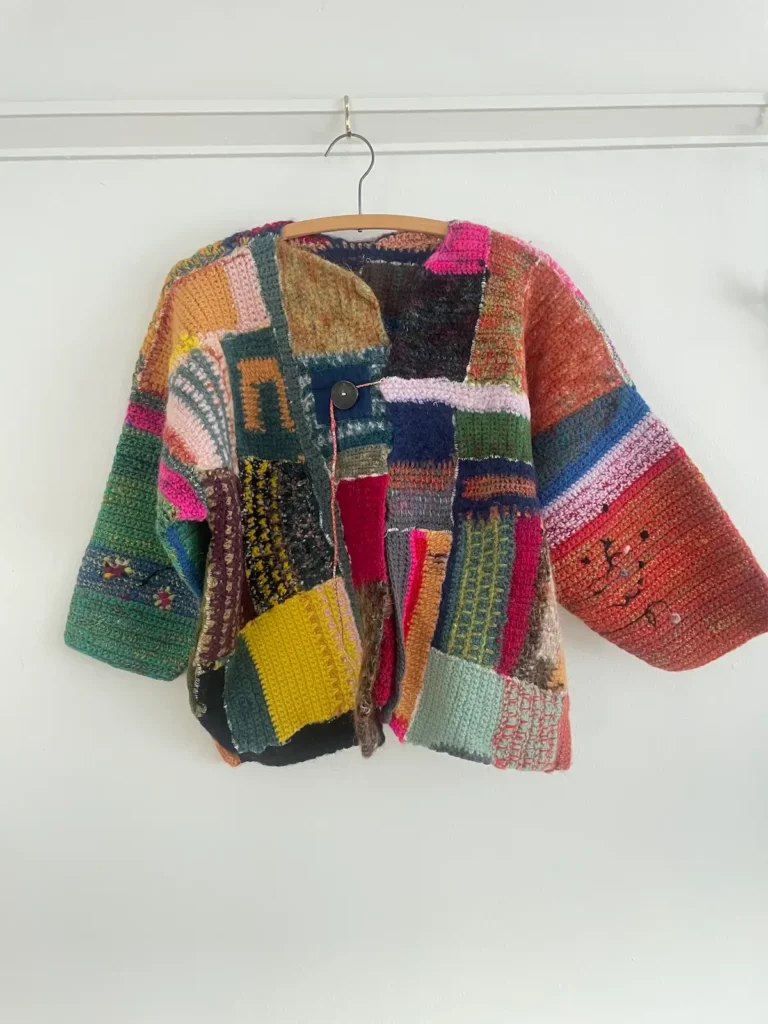 Patchwork knitted and crocheted sweater by Debby Weiss