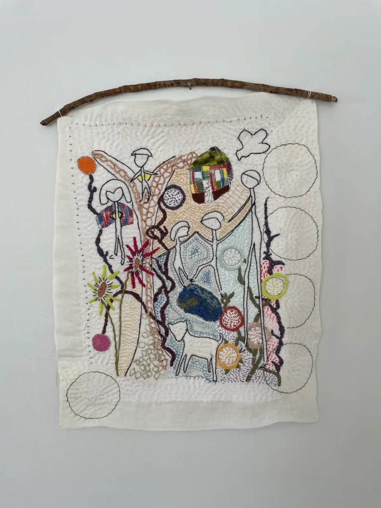Embroidered whole cloth quilt by Debby Weiss