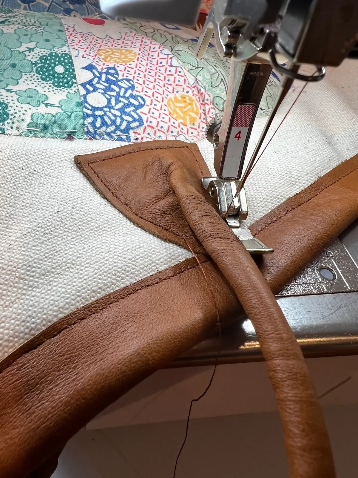 Leather handle with canvas tote bag finish sewing the handle