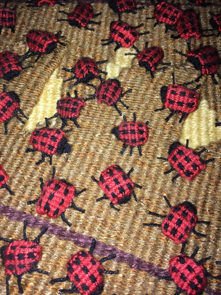 Detail 2 of Nine Spot Lady Bug fiber art by Susan Martin Maffei