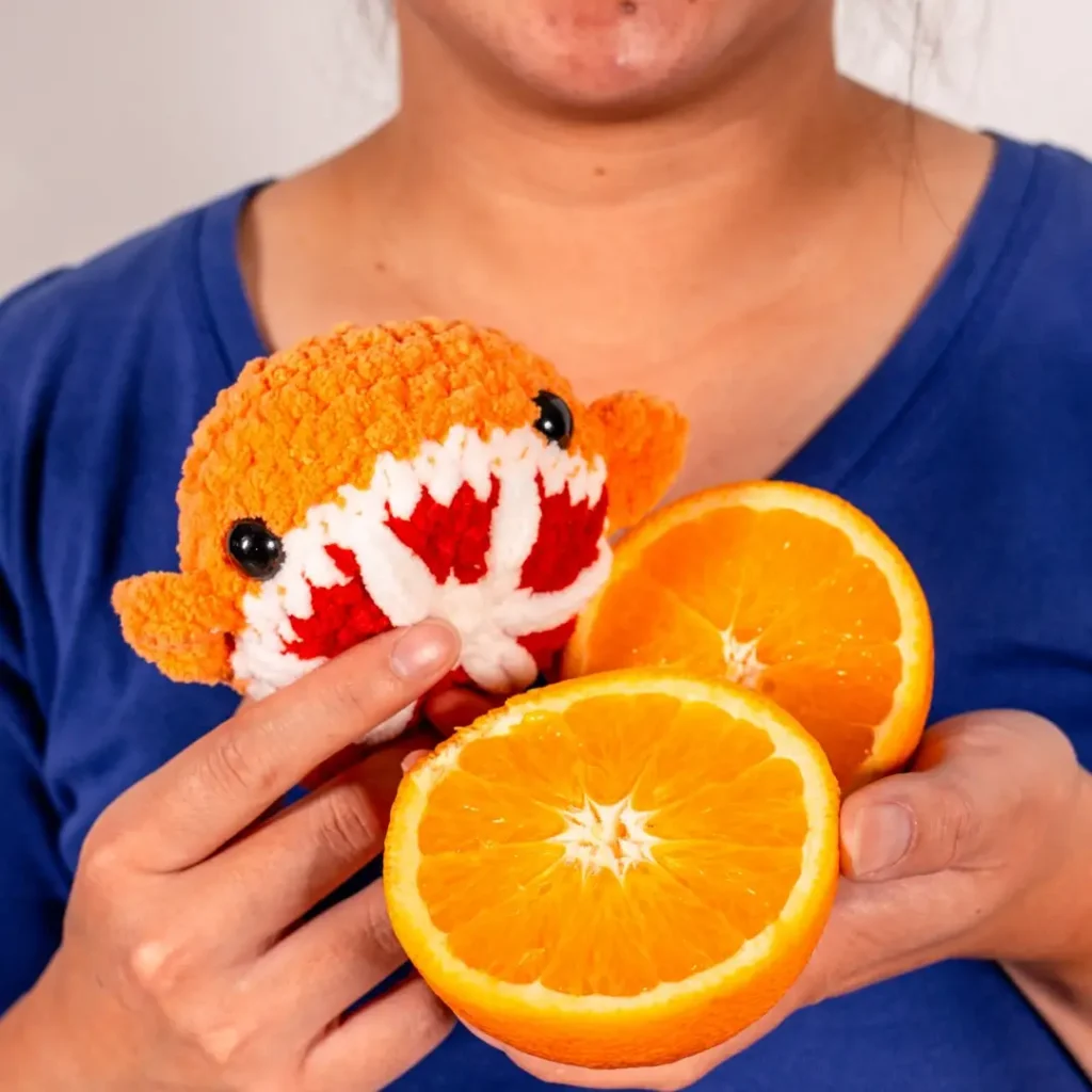 Crochet orange by Avery Tronson