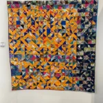 Chris English gold and black quilt