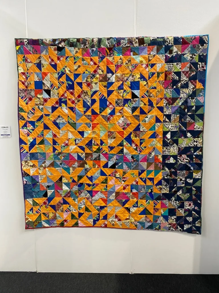 Chris English gold and black quilt