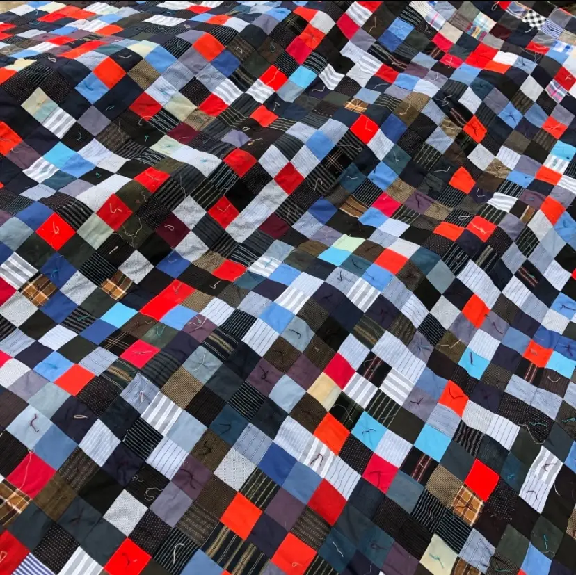 Chris English tied quilt in red blue and black