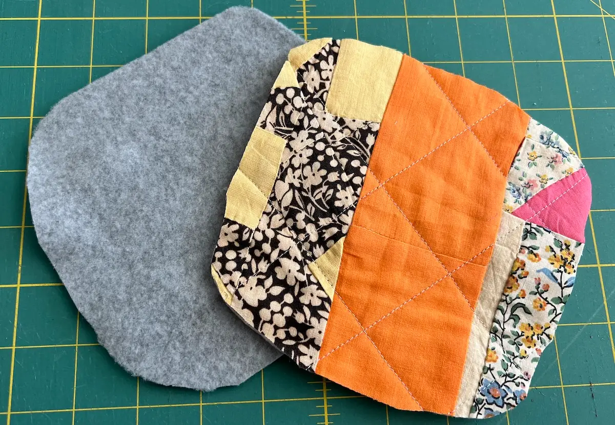 Golf club head covers outer and lining tops of the covers ready for sewing.