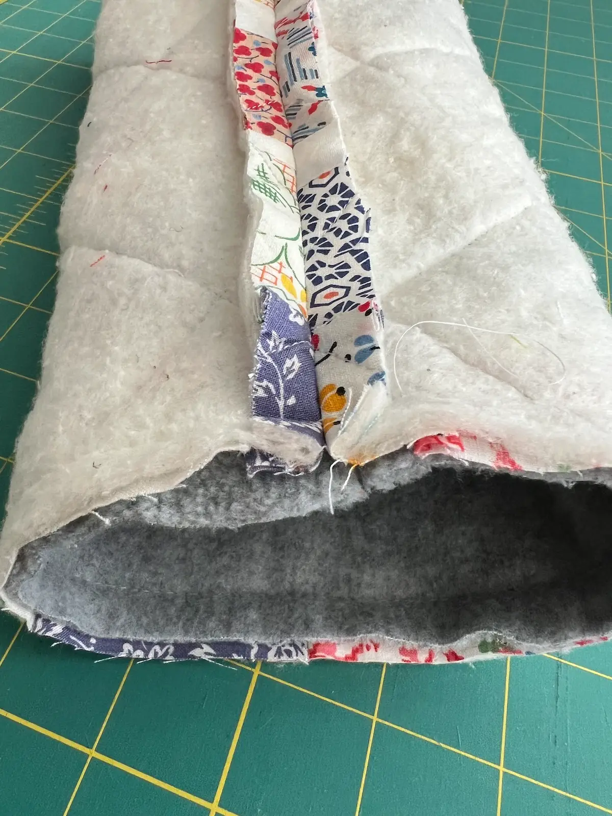 Golf club head covers showing the lining inside the outer cover with right sides together