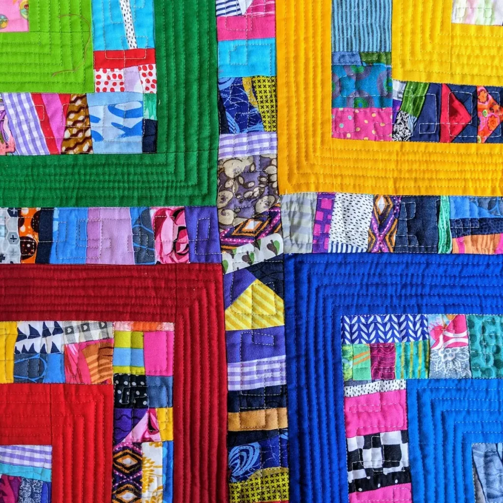 Close up of bright squares quilt by Kate Sandford