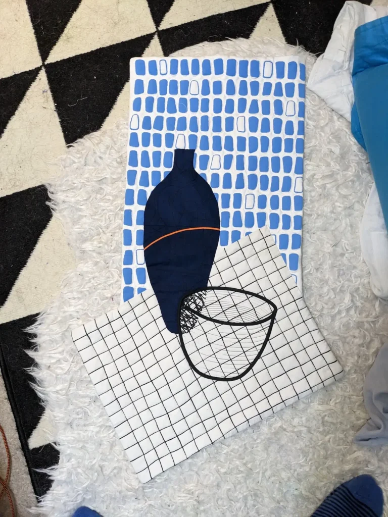 Black vase and bowl quilt by Kate Sandford