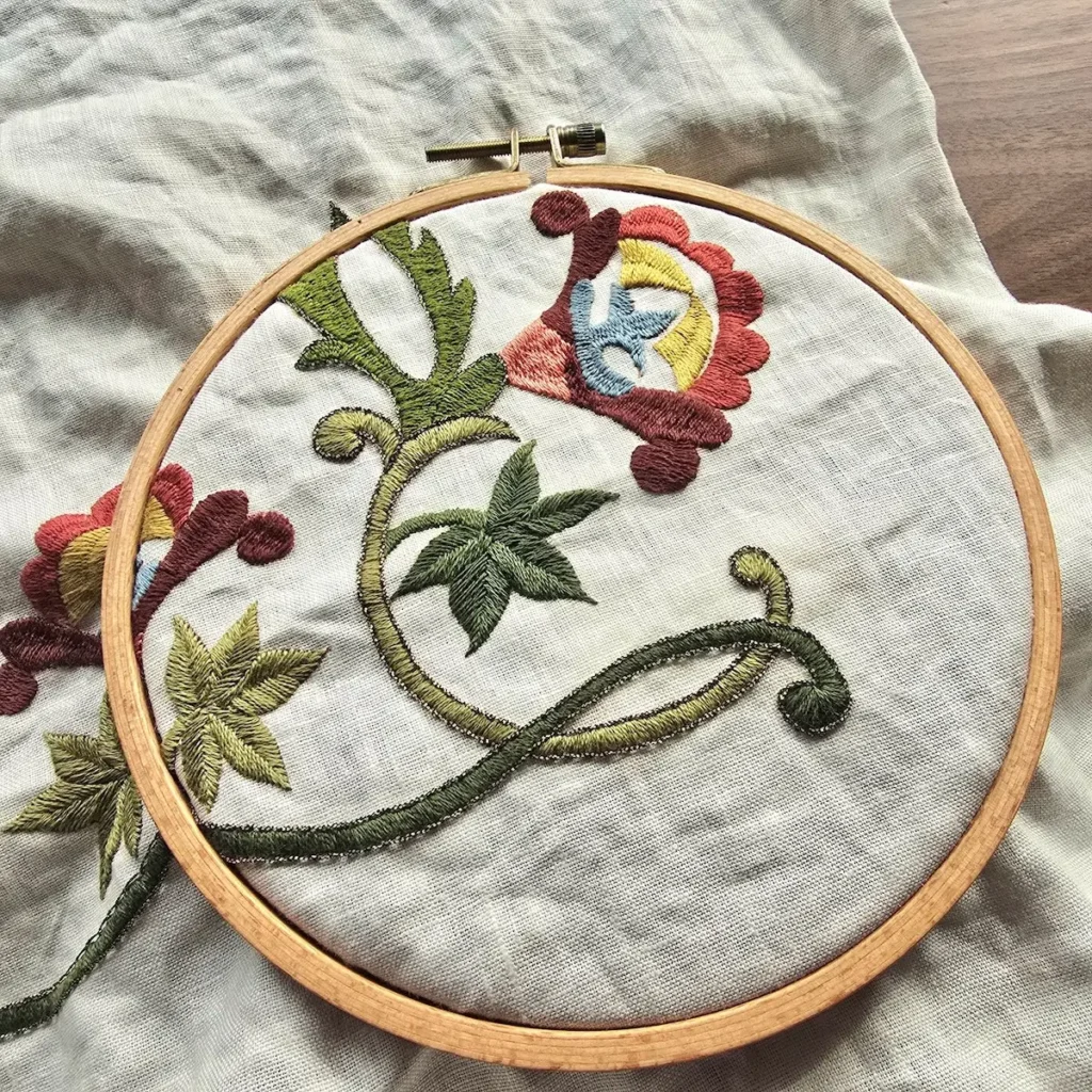 Kithira Begonia in progress using metallic threads by Krista West