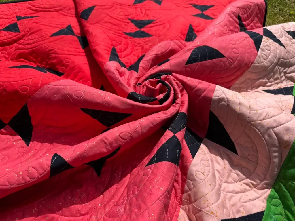 Red and black quilt by Lilo Whitener-Fey