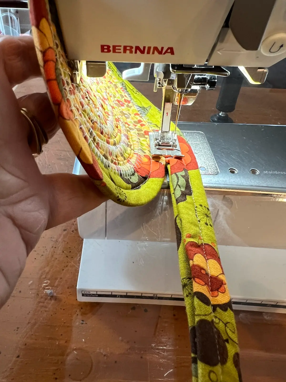 Fabric tube basket beginning to form the sides