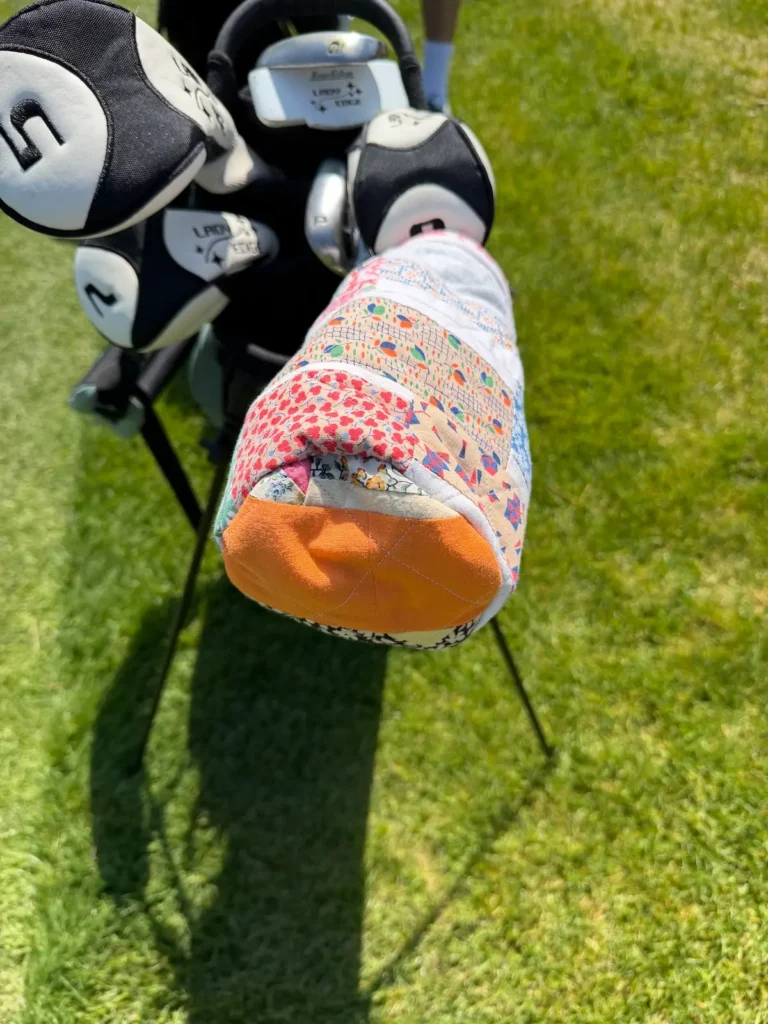 Golf club covers on course 5