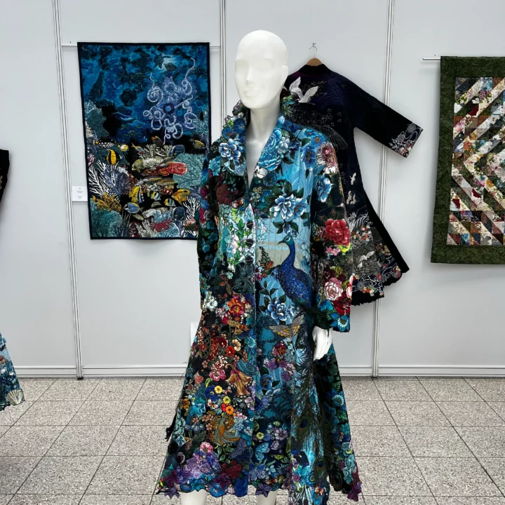 A Pride of Peacocks wearable art by Marijke Van Welzen
