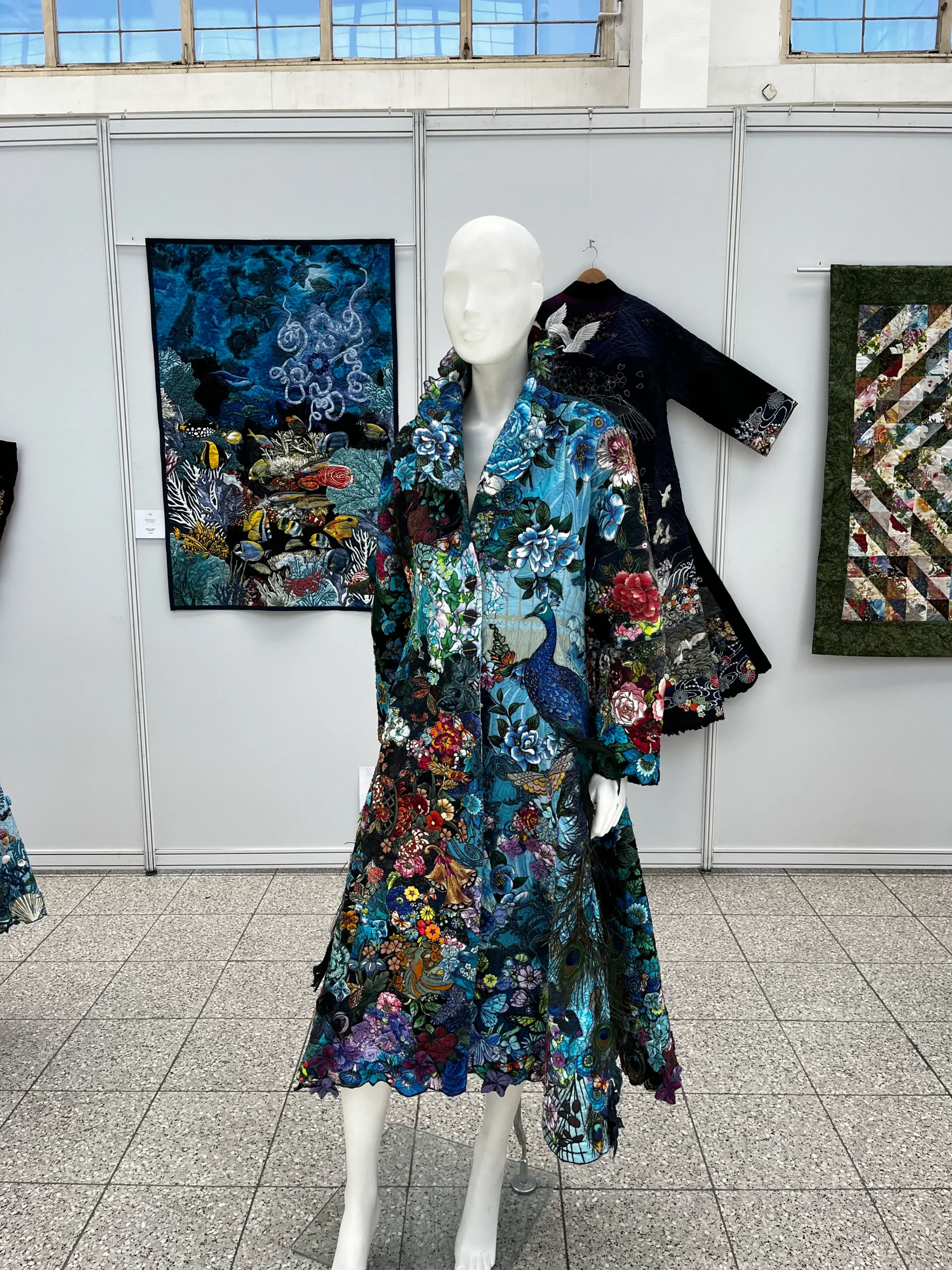 A Pride of Peacocks wearable art by Marijke Van Welzen