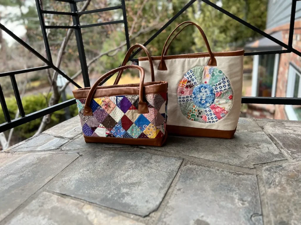 Two patchwork totes with leather handles and leather bottoms