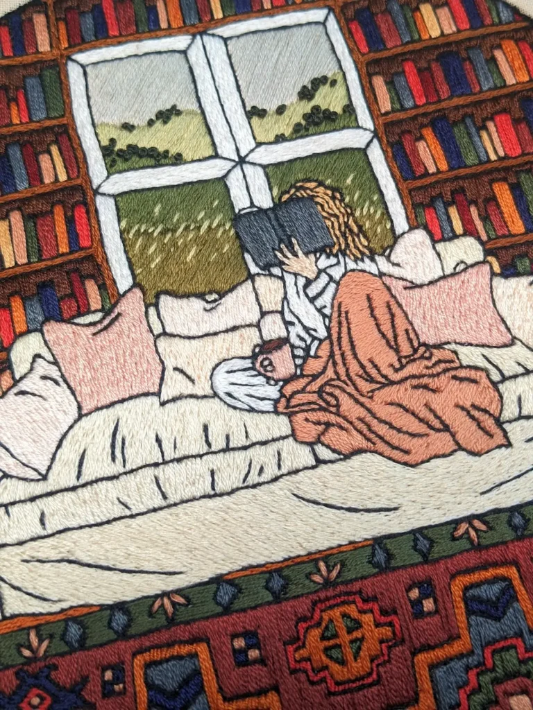 Reading on the Sofa embroidery by Penny Dowdell