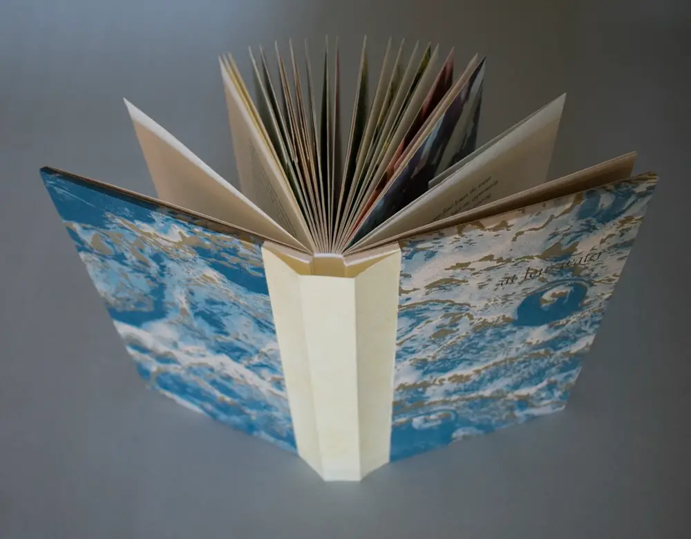 At Low Water open book by Rebecca Chamlee