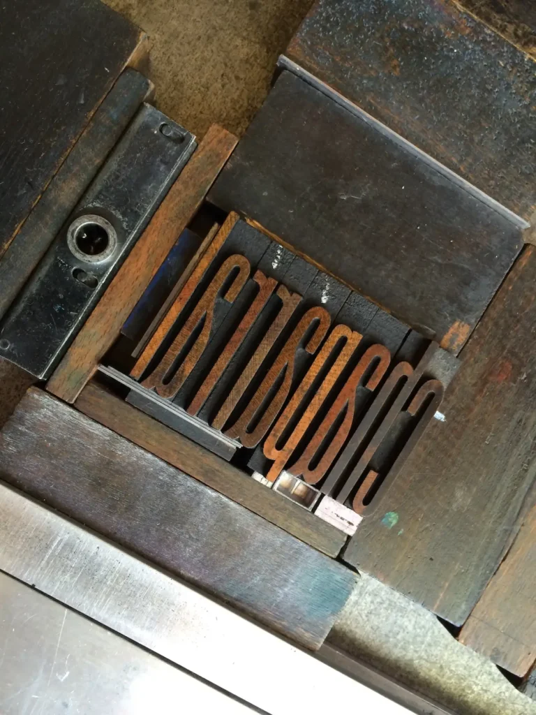 Wood type used to print Where Stucco Meets by Rebecca Chamlee