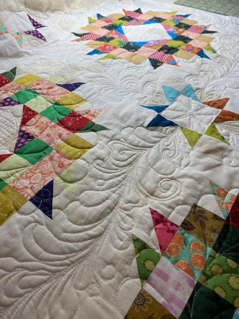 Non-AI quilt, example of free motion quilting by Theresa Benson