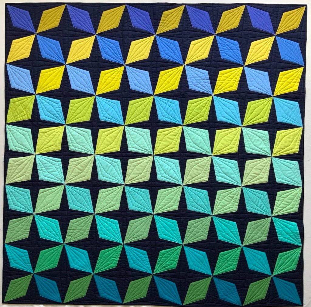 Blue and green diamond quilt by Carolina Oneto