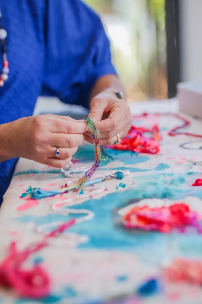 Elizabeth Sullivan working on a piece of art