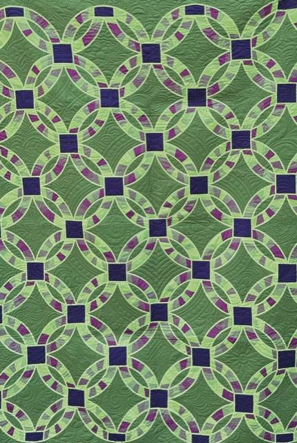Double wedding ring quilt stitched by Karlee Porter