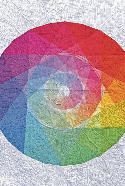 Rainbow quilt stitched by Karlee Porter