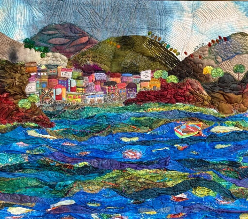 City along the ocean art quilt by Michelle Mischkulnig