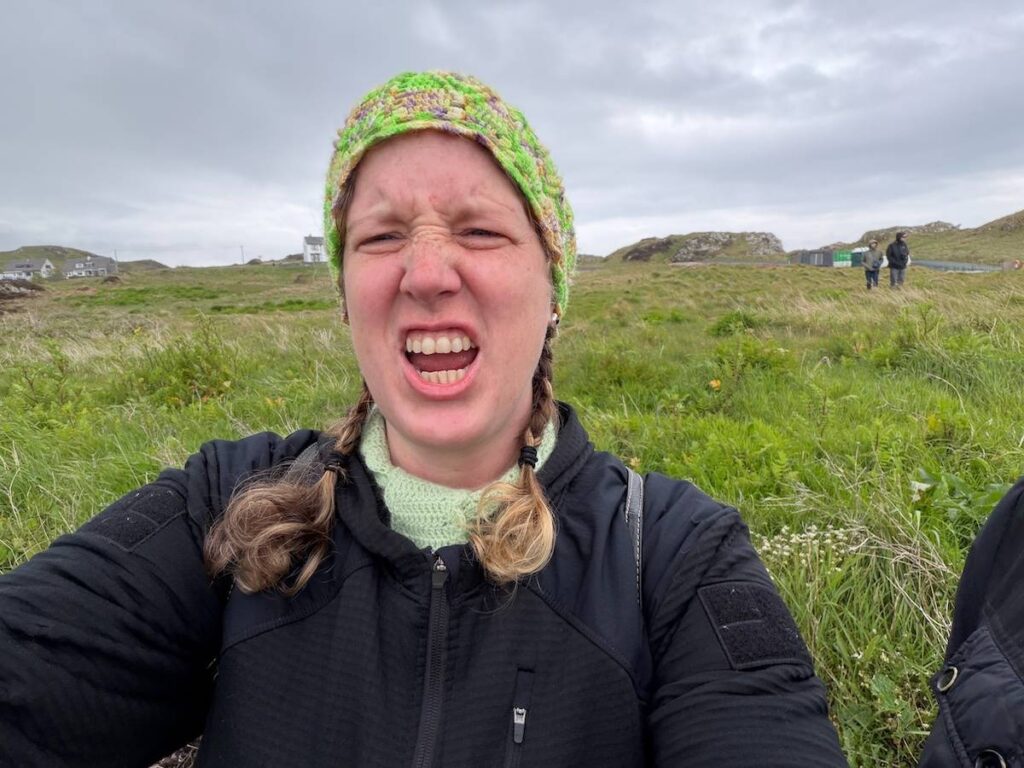 Candace Ohm in a green crocheted hat