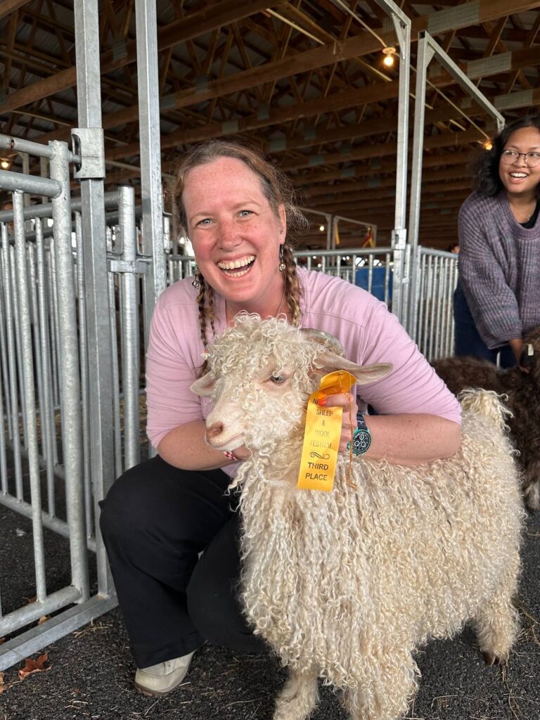 Candace Ohm with a sheep