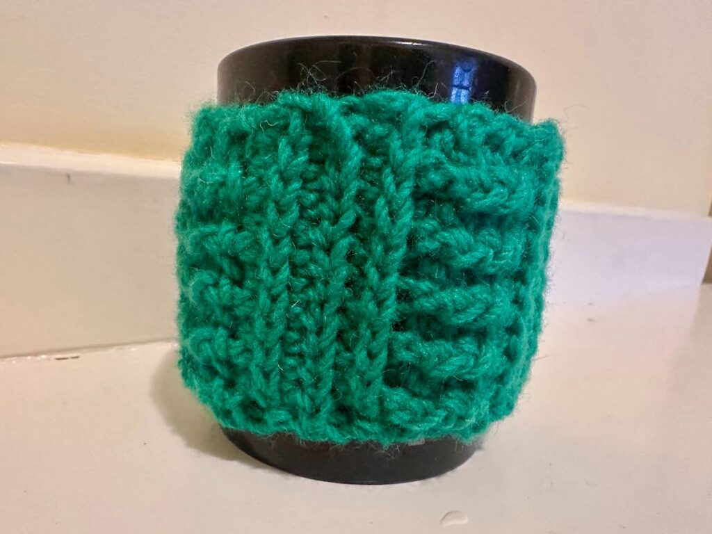 Candace Ohm knitted mug cozy
