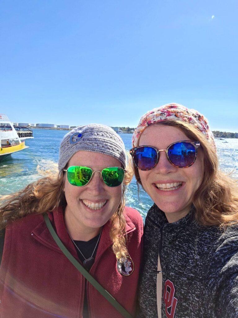 Candace Ohm and a friend in crocheted hats