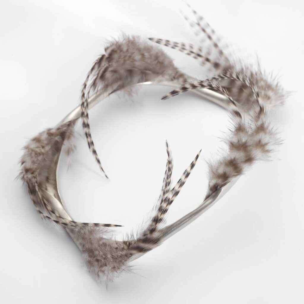 Silver and feather bangle by Emma Jane Champley
