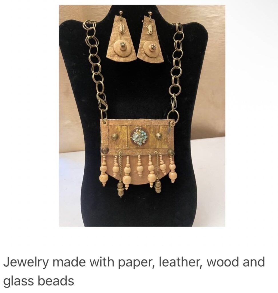 Jewelry made with paper, leather, wood and glass beads by Grace Cormier