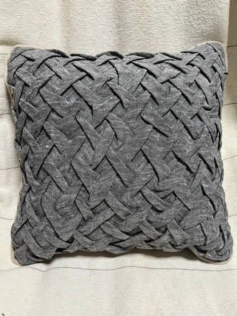 Gray smocked pillow by Kristine Berg