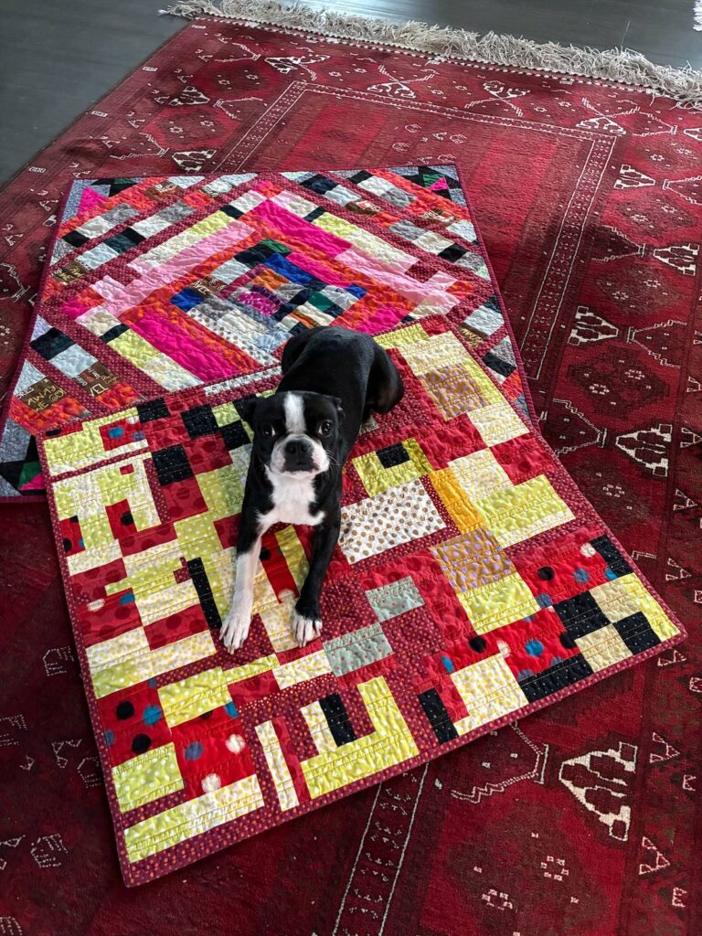 Charlie and her quilts made by Michael Stevenson