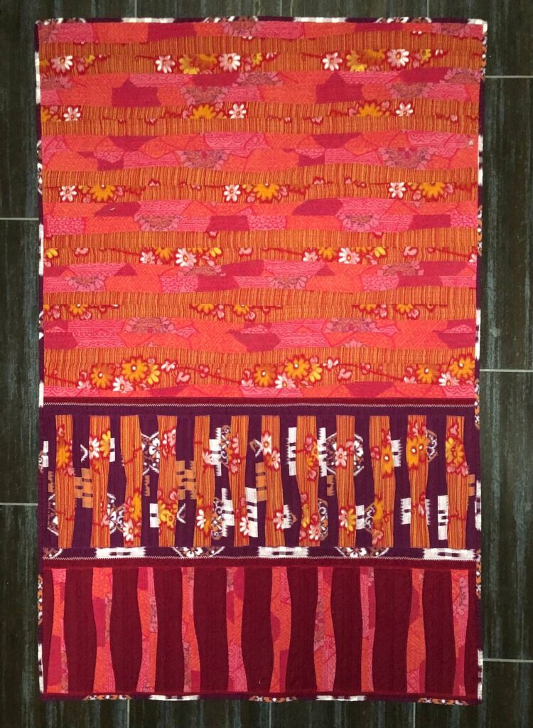 Seeing Red fiber art by Michael Stevenson