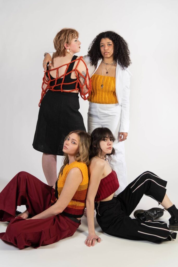 Crocheted clothing modeled by women by Will Chatlosh