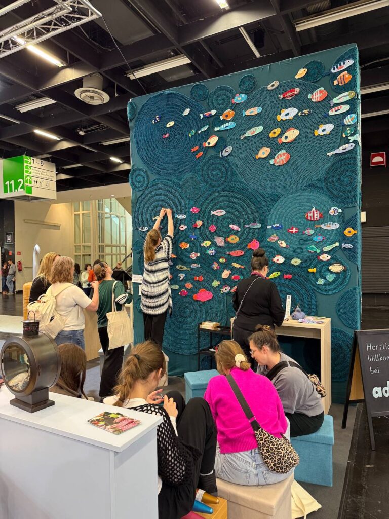 Sea of crocheted fish at an exhibit by Will Chatlosh