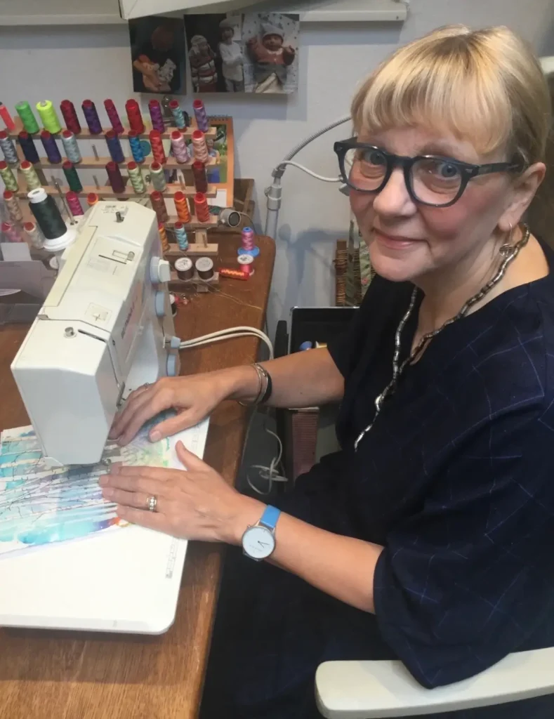 Dot Ronaldson at her sewing machine