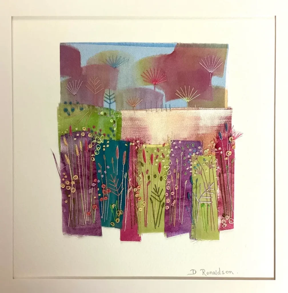 Dot Ronaldson landscape collage with embroidery in maroons and greens