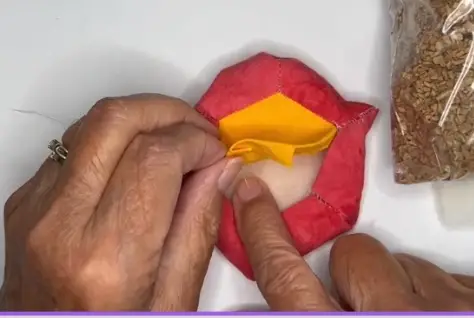 Hexie flower pincushion add a layer of wool batting