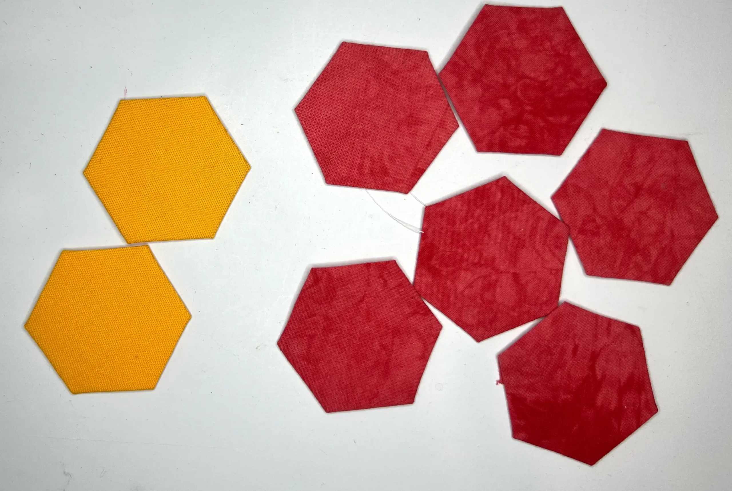 Hexie flower pincushion start with 6 for flower petals and 2 for flower centers