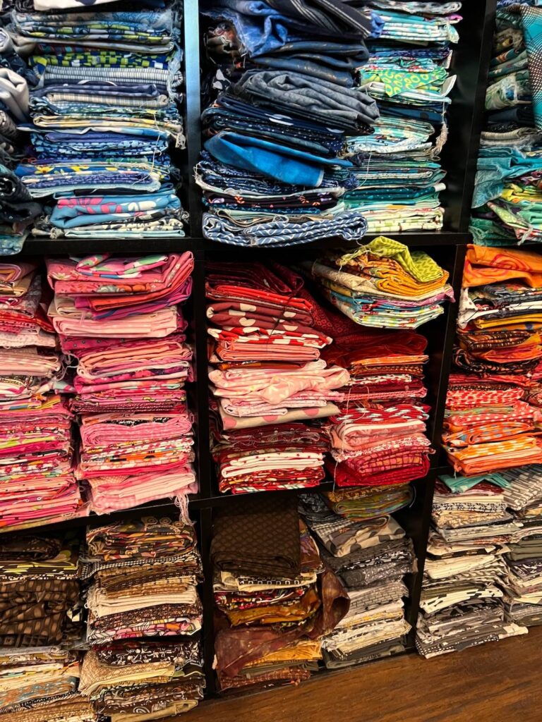 Fabric storage organization showing folded fabrics