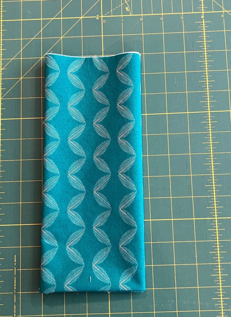 Final folded fabric for fabric storage and organization