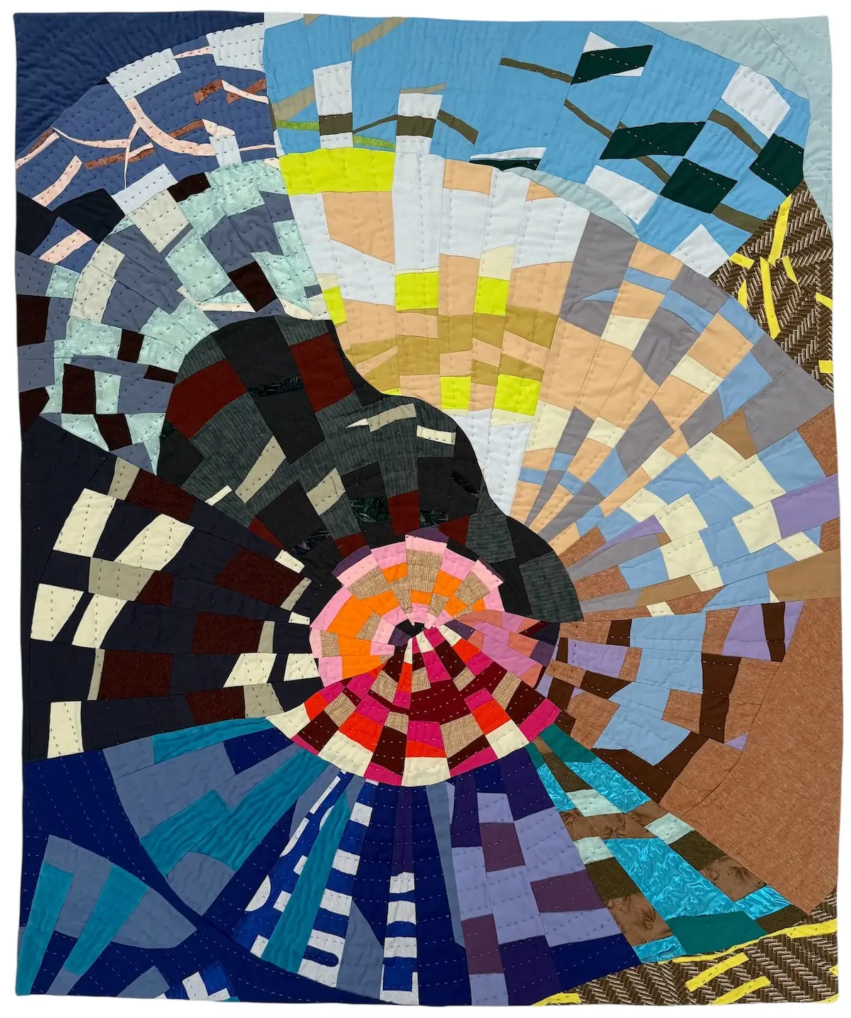 Circular quilt with multiple colors by Amanda Milz