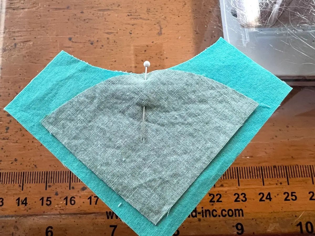 Button quilt block tip pin the center of the pie to the 'L' when making the drunkard path block