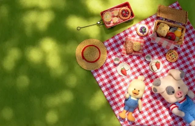 Pig and Duck at a picnic needle felted by Chelsea Trousdale