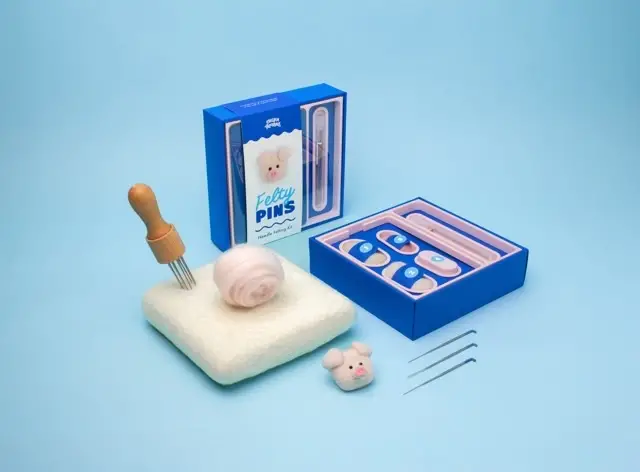 Pig needle felting kit and work in progress by Chelsea Trousdale