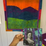 Art quilts showing ancestors and mountains by Dr. Jaleesa Wells